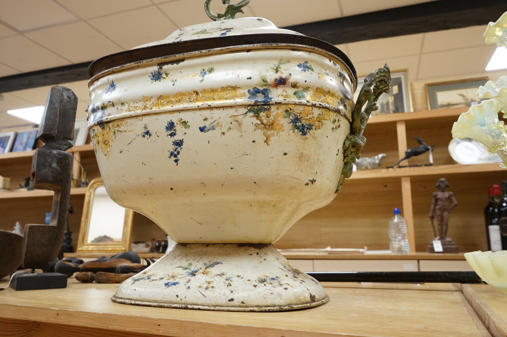 A 19th century painted toleware log box and cover hand painted with flowers, 58cm wide